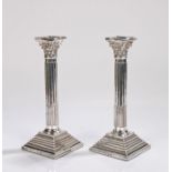 Pair of Elizabeth II silver candlesticks, London 1973, maker C S R Ltd, of corinthian column form,
