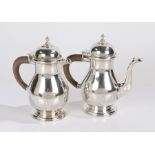 George V silver hot water and coffee pots, London 1913, maker William Comyns & Sons, each with a