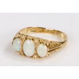 18 carat gold opal set ring, with three cabochon opals to the head, 5.9 grams, ring size Q