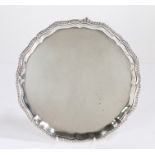 George V silver salver, London 1914, maker Reid & Sons, with gadrooned scalloped border, raised on