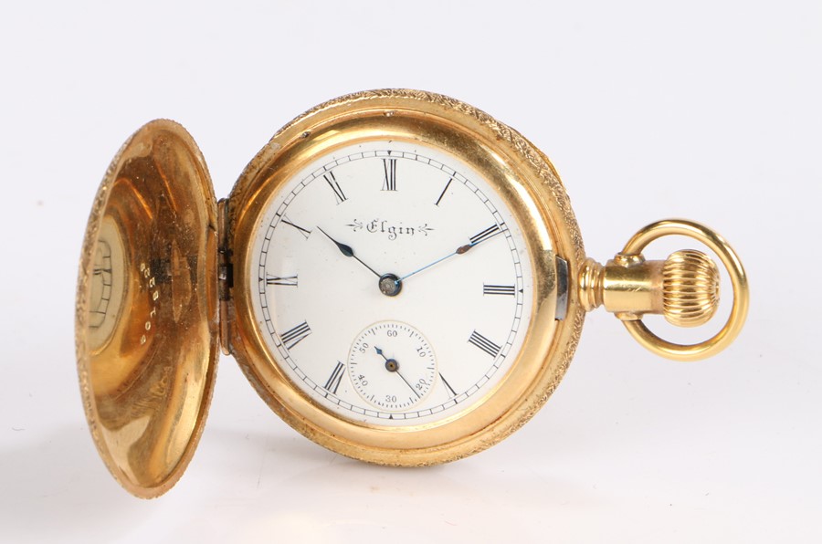 Elgin 18 carat gold ladies hunter pocket watch, the case with foliate decoration and shield shaped