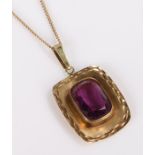 9 carat gold amethyst set pendant necklace, with a emerald cut amethyst to the arched gold panel,