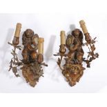 Pair of mid 19th Century French carved wood and giltwood armorial wall lights, each carved with a