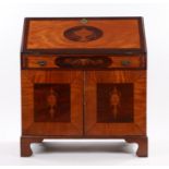19th Century mahogany inlaid bureau, the rectangular crossbanded top above a sloping fall with an