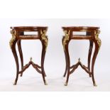 Pair of French Empire style bijouterie tables, the walnut veneered tables with a glazed circular top
