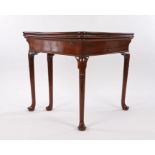 George II mahogany double folding tea table and writing table, circa 1740, the triangular fold