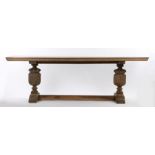 Early 20th Century oak refectory table, in the Elizabethan taste, the long rectangular top above two