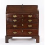 George III mahogany bureau, of small proportions, the rectangular top above a sloping fall