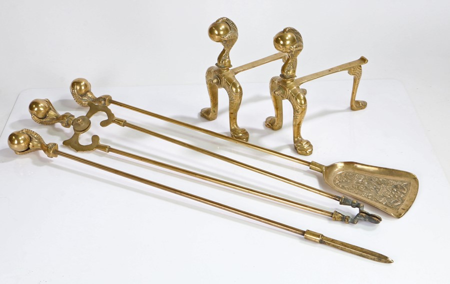 Early 20th Century brass companion set, consisting of shovel, tongs, poker and pair of fire dogs,
