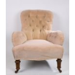 Gillow: A Victorian Upholstered Armchair, circa 1870, the arched back above a stuff over seat