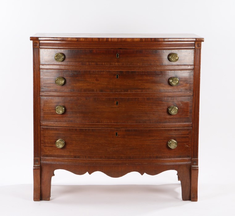 Regency mahogany bowfront chest of drawers, the crossbanded top above four long graduated drawers