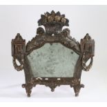18th Century carved and painted and parcel gilt easel mirror, having a shaped mirror plate in a