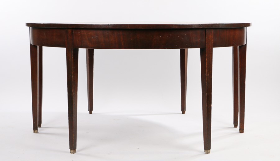 Pair of George III mahogany tables, of demi lune form, raised on square tapering legs, 137cm wide,