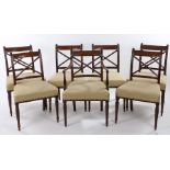 Regency set of seven mahogany dining chairs, the bar back above an X splat and stuff over sear above