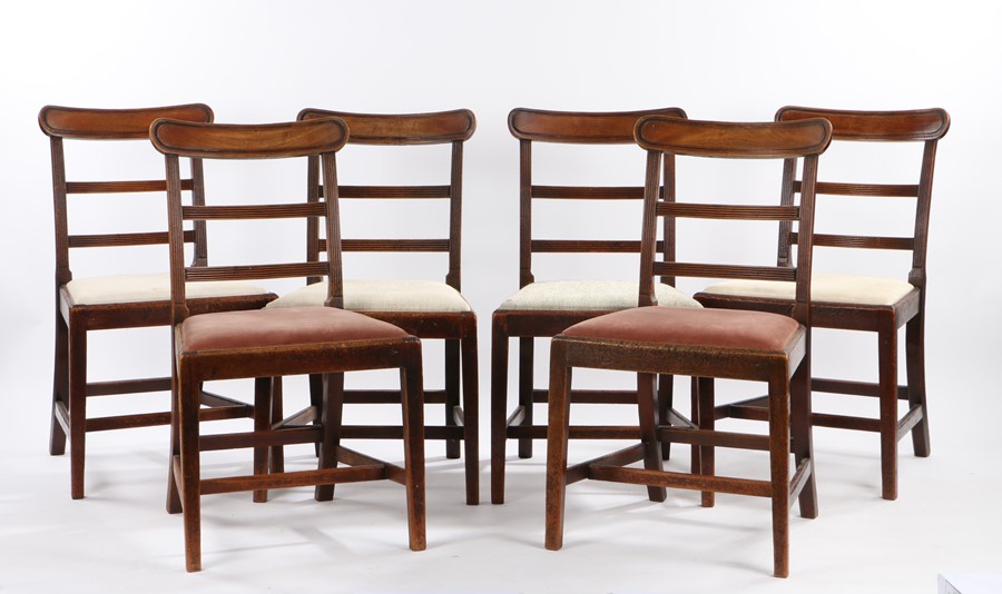 Set of six George III mahogany dining chairs, the oval curved cresting rails above reeded splat