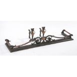 19th century brass and cast iron fire surround, together with matching dragon fire dogs, (3)