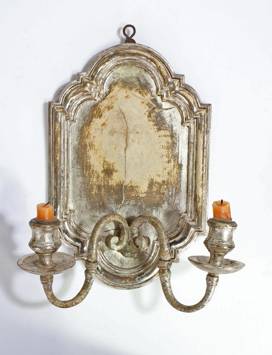 Silver gilt girandole with two scrolled candle arms, the sconces with drip pans, 28cm wide, 36.5cm
