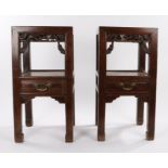 Pair of Chinese hardwood tables, the square dished tops above an open recess and central drawer with