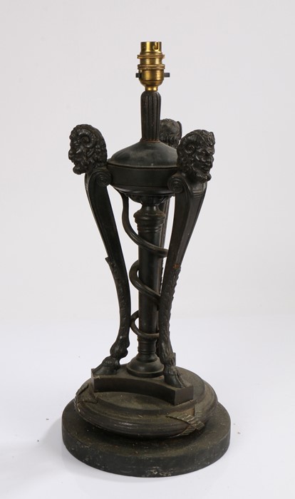 Neoclassical desk or table lamp, with three arched supports depicting fauns above a circular base,