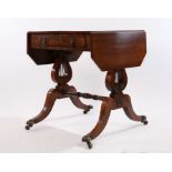 Small Regency rosewood and brass inlaid sofa table, the drop leaves with canted corners, with frieze