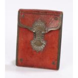 George III leather needle case, in red with a white metal clasp