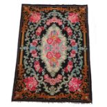 Modern Persian Bijar Kilim rug, the black ground with foliate and scroll decoration, 300cm x 210cm