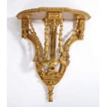 19th Century gilded wall bracket, the demi-lune top above harebell swag and foliate decoration, 40cm