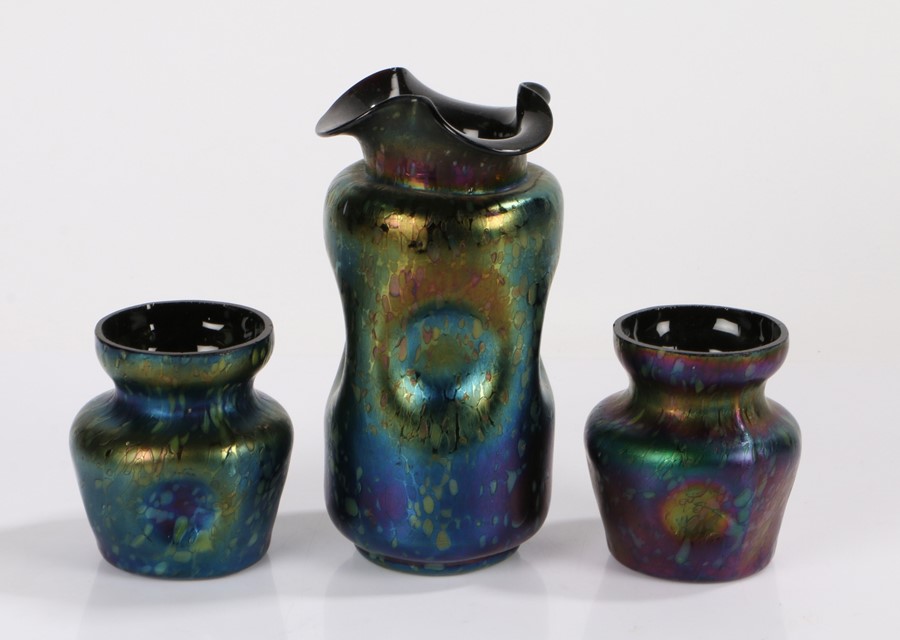 Trio of Art Nouveau iridescent glass vases, possibly Loetz, the larger vase with a folded lip