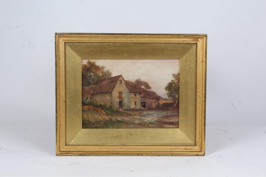 C.P. Hunt, farm buildings with trees to the rear, signed watercolour, housed in a gilt glazed frame,