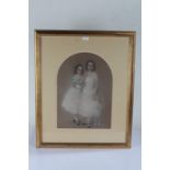 19th Century full length pastel portrait of two sisters in white dresses, housed in a glazed gilt