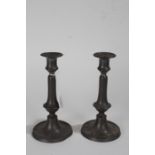 Pair of Victorian pewter candlesticks, with gadrooned borders, 22.5cm high (2)