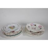 Collection of 19th Century and later plates, mostly decorated with flowers, one with an impressed