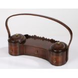 Edwardian mahogany portable sewing/companion work box, of serpentine form, having shaped carrying