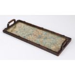 Chinese hardwood tray, with carrying handle either side and incorporating early silk panels, 49.