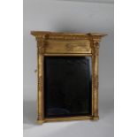 Regency gilded wooden pier mirror, having moulded breakfront cornice, above a rectangular plate with