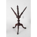 19th century mahogany cat, raised on tripod legs, 38.5cm high