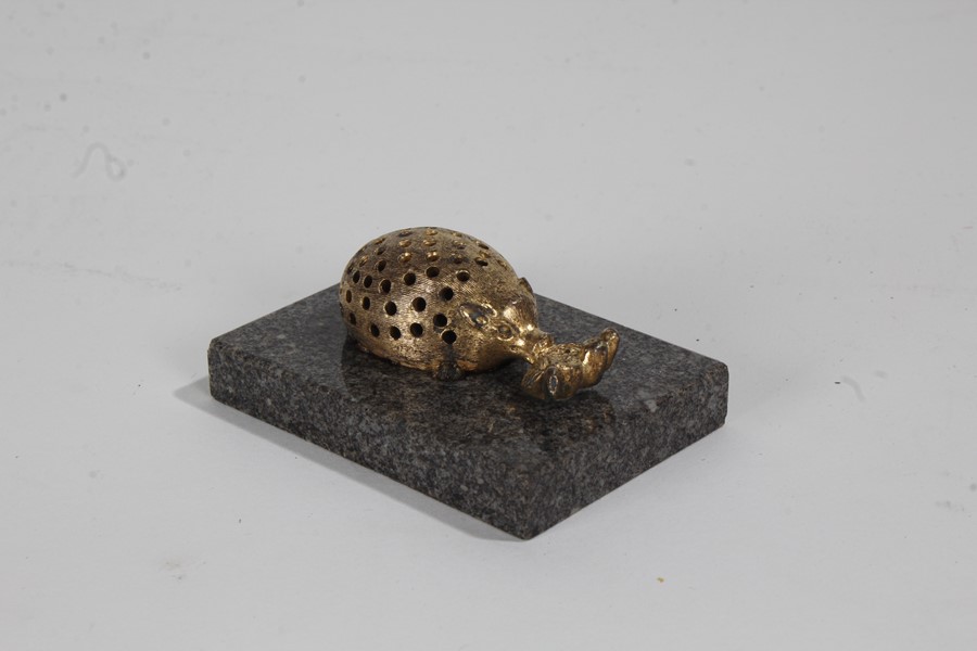 19th century gilt metal novelty toothpick holder, modelled as a hedgehog, raised on marble base, 7.