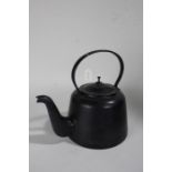 Very large metal kettle, with shaped carrying handle and lift up lid, 37cm high