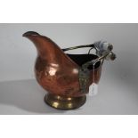 Victorian copper and brass coal scuttle, with porcelain handles and lion mask motif