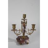 19th century marble and brass candelabra, having scrolling branches raised on a rouge marble