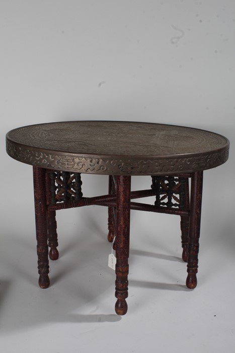 Middle Eastern brass tray top table, the brass embossed tray centred with the Star of David and