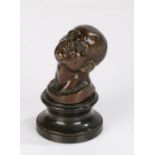 19th century Grand Tour bronze, head of a Nubian, raised on a turned serpentine base, 10.5cm high