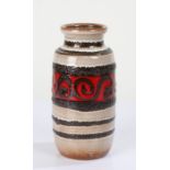 Mid 20th century West German pottery vase, with a band of swirls on red ground, 20cm high