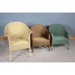 Three Lloyd Loom armchairs, in cream, green and gold (3)