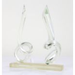 Murano style glass table centrepiece, formed from two scrolled glass canes, on a plinth base, 31.5cm
