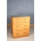 G-Plan light oak chest, fitted five long drawers, stamped to drawer. 75cm wide x 46cm deep x 97.