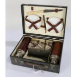 Mid 20th Century picnic set, the hinged lid enclosing a fitted interior with two flasks, a metal box