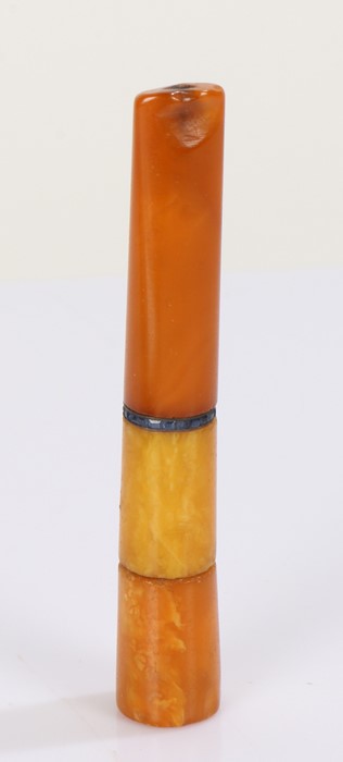 Art Deco style amber cheroot holder, inset with a band of sapphires, 8.5cm long