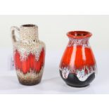 Two small West German pottery lava vases, the first with a handle and a band of red, 14cm high,