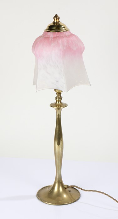 Brass table lamp with a shaped mottled glass shade in pink and white, 54cm high
